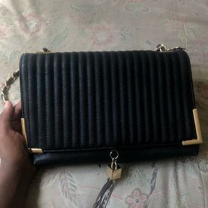 Bebe black and gold womens bag